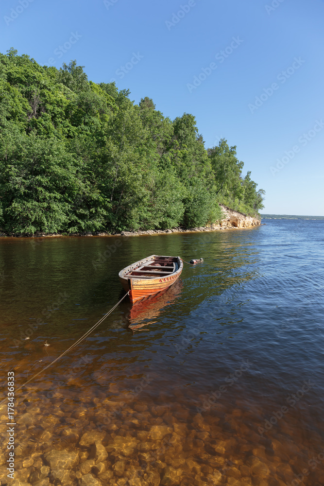 old wooden boat on the river