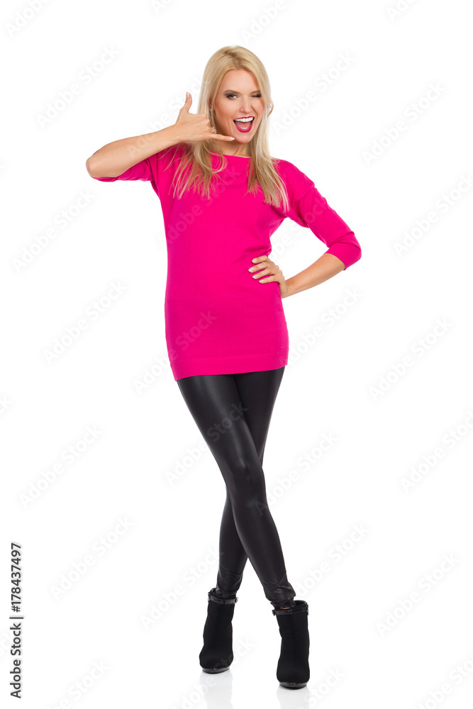 Fototapeta premium Beautiful Blond Woman Is Showing Call Me Hand Sign