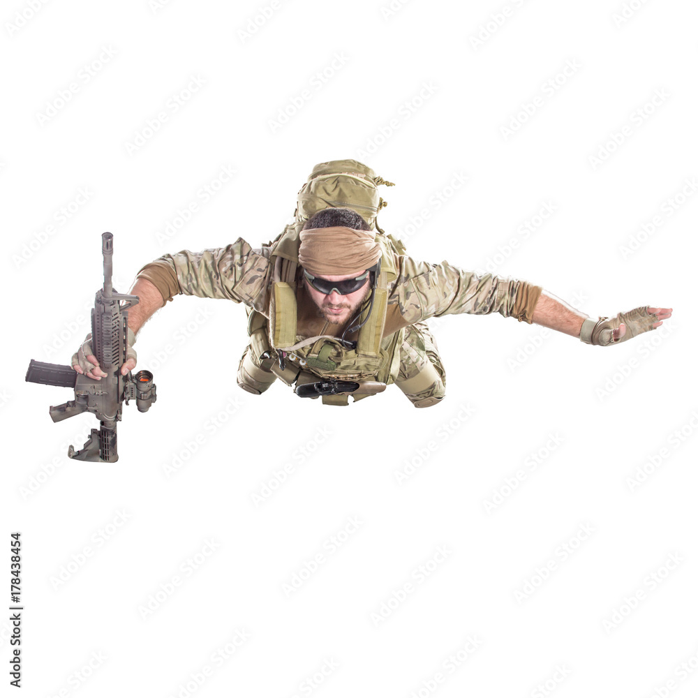 USA Army soldier with rifle (motion effect).  Shot in studio on white background. Action concept