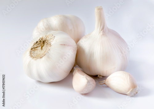Garlic and Garlic Cloves and bulb on white background.