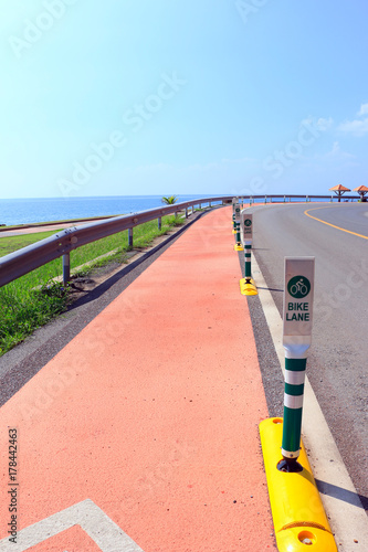Bike lane in side the sea and mountain