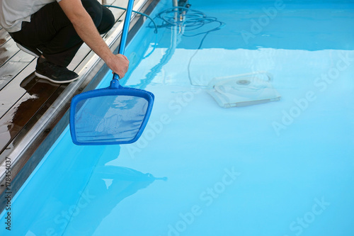 Pool cleaner during his work © polack