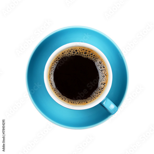 Full black coffee in blue cup close up isolated