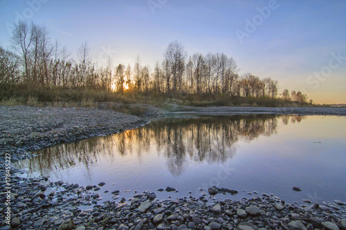 Autumn sunset with river. Horizontal background