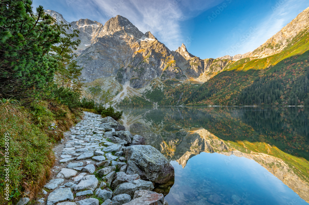 Fototapeta premium Tatra mountains, footpath and Morskie Oko lake, fall morning, Poland