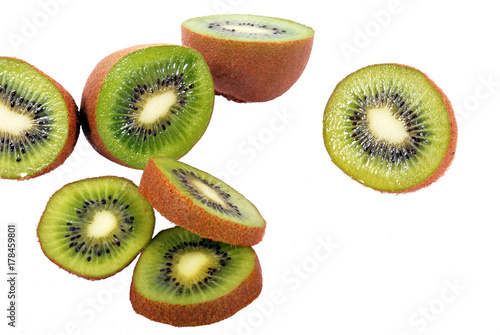 Fresh kiwi fruits isolated on white background - Healthy eating concept - aufgeschnittene Kiwis  photo