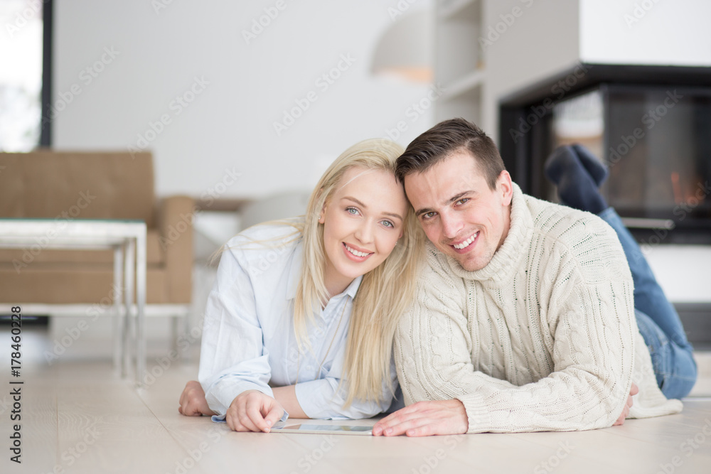 Young Couple using digital tablet on cold winter day Young Couple using digital tablet on cold winter day