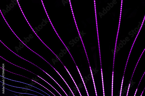 Neon abstract background of lines and bokeh 