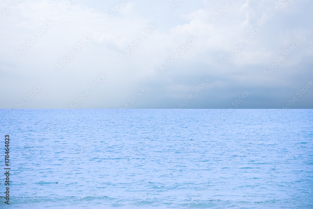 Blue sea/ocean and clouds sky abstract background in Thailand. horizon over view. summer relaxing time.