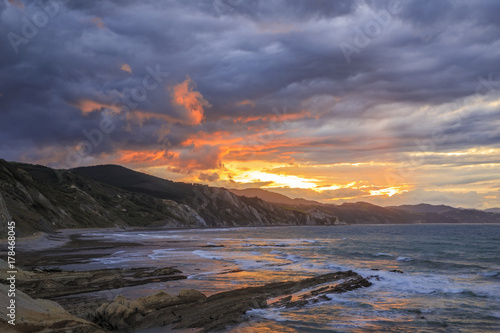 Itzurun beach is known locally as the flysch at sunset near Zambia small town in Northern Spain
