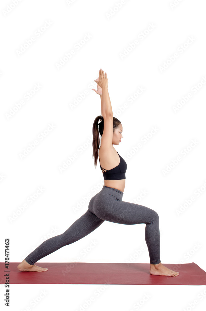 young asian woman doing yoga in Crescent Lunge yoga or Warrior One pose on the mat isolated on white background, exercise fitness, sport training, healthy lifestyle concept young asian woman doing yoga in Crescent Lunge yoga or Warrior One pose on the mat isolated on white background, exercise fitness, sport training, healthy lifestyle concept