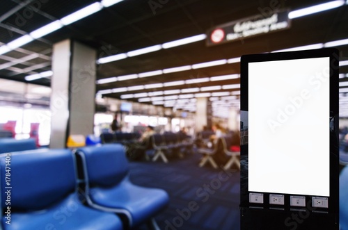 Fototapeta Naklejka Na Ścianę i Meble -  mock up of blank showcase light box or advertising billboard for your text message or media content at waiting zone in terminal at the airport, commercial, marketing and advertising concept