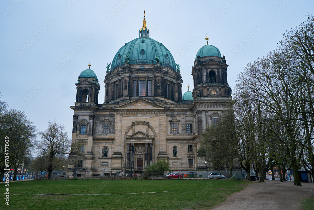 Berliner Dom seen from the garden on a cloudy day