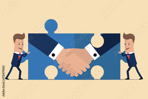 Two businessmen holding puzzle elements with a handshake. Partnership concept. Symbol of a successful transaction. Vector illustration