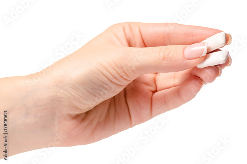 Female hand chewing gum
