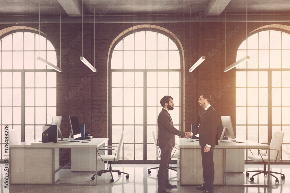 Brick office, arch windows side, men Brick office, arch windows side, men