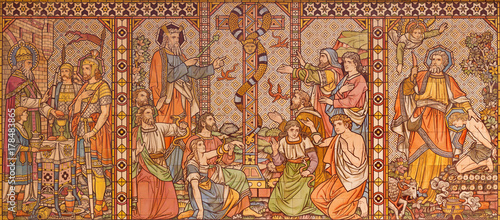 LONDON, GREAT BRITAIN - SEPTEMBER 15, 2017: The tiled mosaic of Old testament scenes with the patriarchs, Melchizedek, Moses and Abraham in church All Saints by Matthew Digby Wyatt (1820 - 1877).