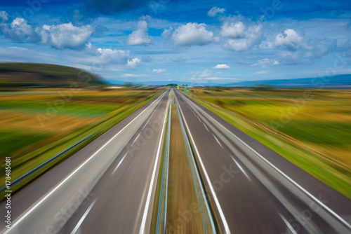 Modern highway going through fields © Marko Rupena