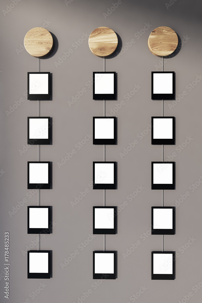 Fototapeta premium Rows of photos on gray wall