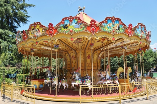 Nostalgic children‘s carousel in a park in the center of Tirana, Albania. Southeast Europe.