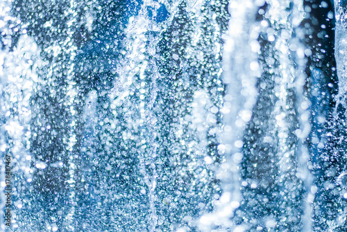 The gush of water of a fountain. Splash of water in the fountain, abstract image