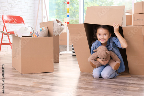 Cute little girl in moving ...