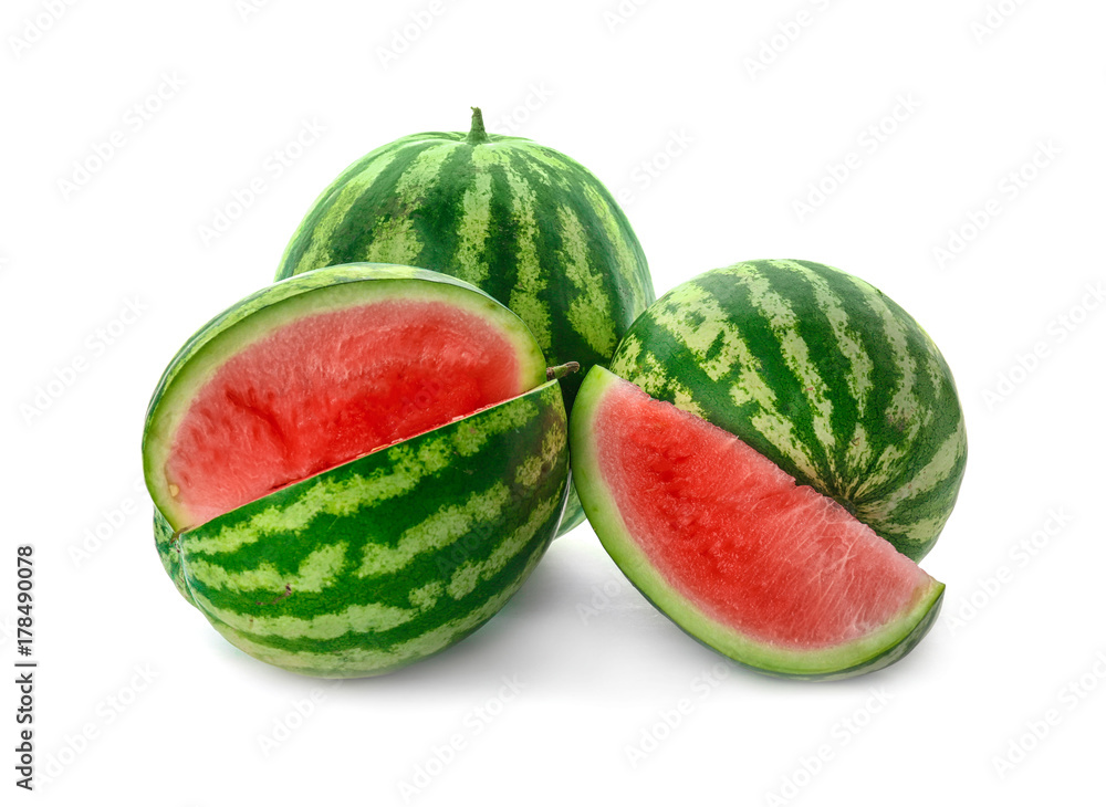 Watermelons with slice on white background