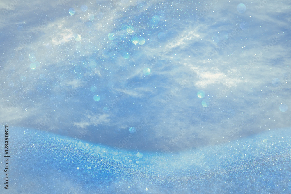 Obraz premium glitter vintage lights background. light blue and silver. de focused