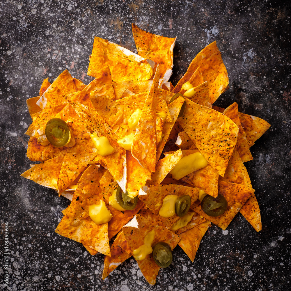 Nachos chips with mustard and jalapeno. Nachos chips with mustard and jalapeno.