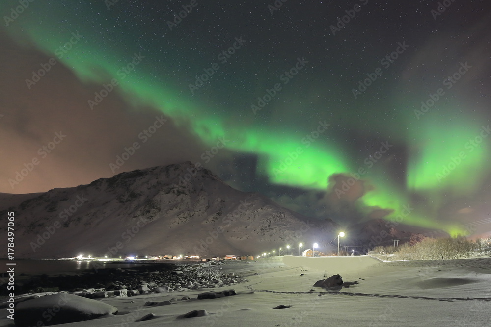 Aurora borealis-Polar lights-Northern lights over Vareid beach. Flakstadoya island-Lofoten-Norway. 0457