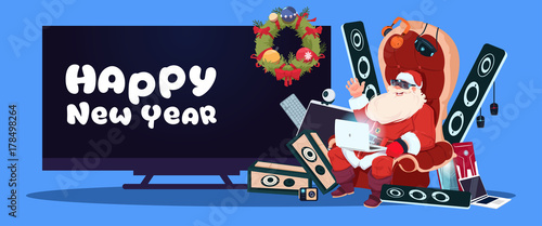 Happy New Year Banner With Santa Claus Sitting With Modern Electronics Gadgets And Plasma Tv On Background Vector Illustration