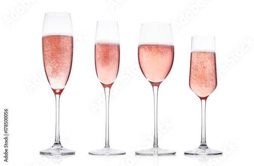Champagne rose glasses with bubbles on white