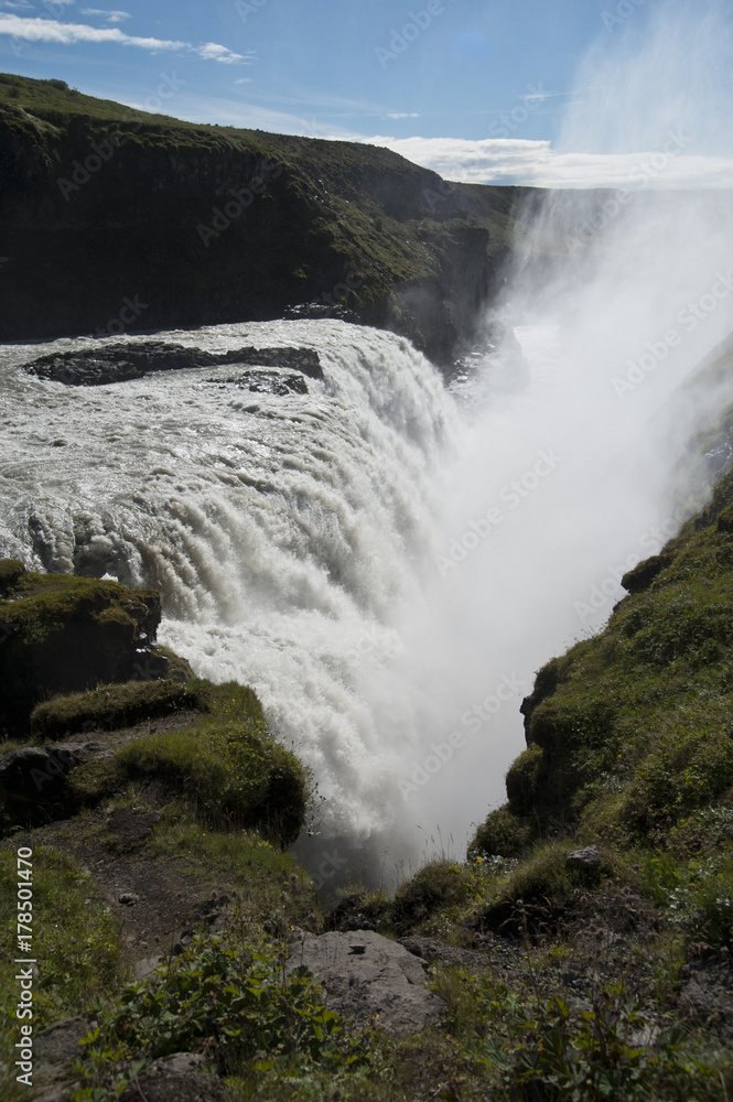 Typical Icelandic landscape of Gullfos Falls, a wild nature of rocks and shrubs. Typical Icelandic landscape of Gullfos Falls, a wild nature of rocks and shrubs.