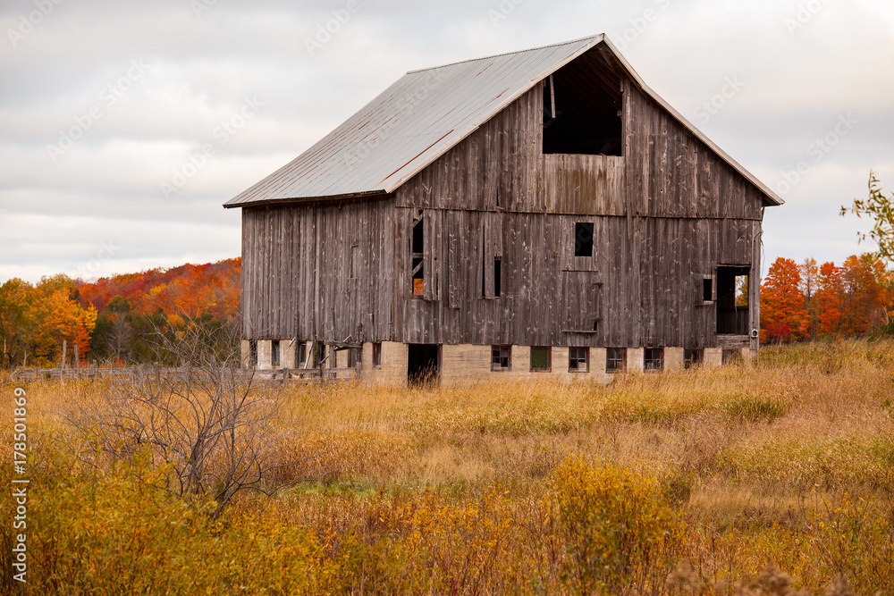 Wood barn surrounded by fall color