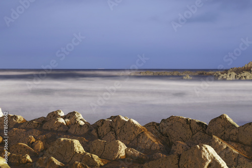 Serene seascape in Atxabiribil beach  Biscay  Basque Country  Spain. Long exposure shot.