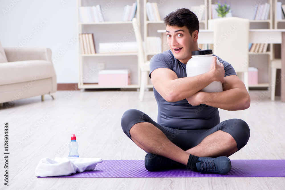 Man with food supplements in sports and healthy lifestyle concep Man with food supplements in sports and healthy lifestyle concep