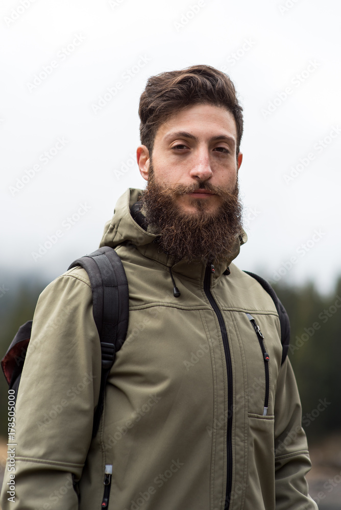 Hipster Adventurer hikes along Lake Obernberg in the mountains of Austria Hipster Adventurer hikes along Lake Obernberg in the mountains of Austria