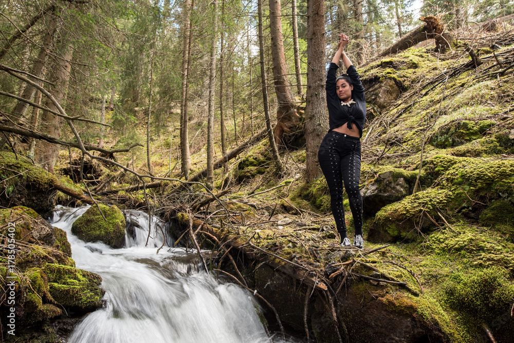Girl hikes along Lake Obernberg in the mountains of Austria Girl hikes along Lake Obernberg in the mountains of Austria