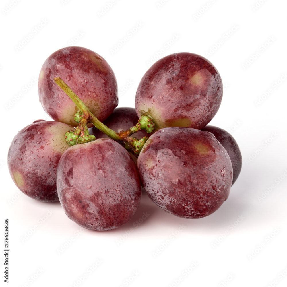 Red grape berry bunch isolated on white background cutout Red grape berry bunch isolated on white background cutout