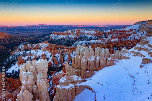 Fabulous snowy view at sunset of Bryce Canyon National Park in Utah.