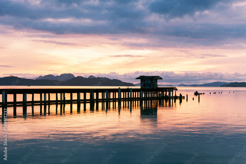 scenery view of old jetty to the sea beautiful sunrise or sunset dramatic sky in phuket thailand