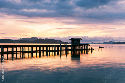 scenery view of old jetty to the sea beautiful sunrise or sunset dramatic sky in phuket thailand