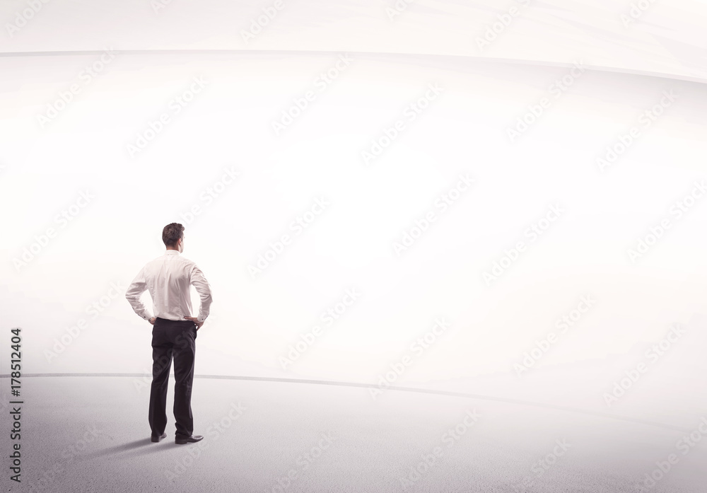 Businessman with briefcase standing still Businessman with briefcase standing still