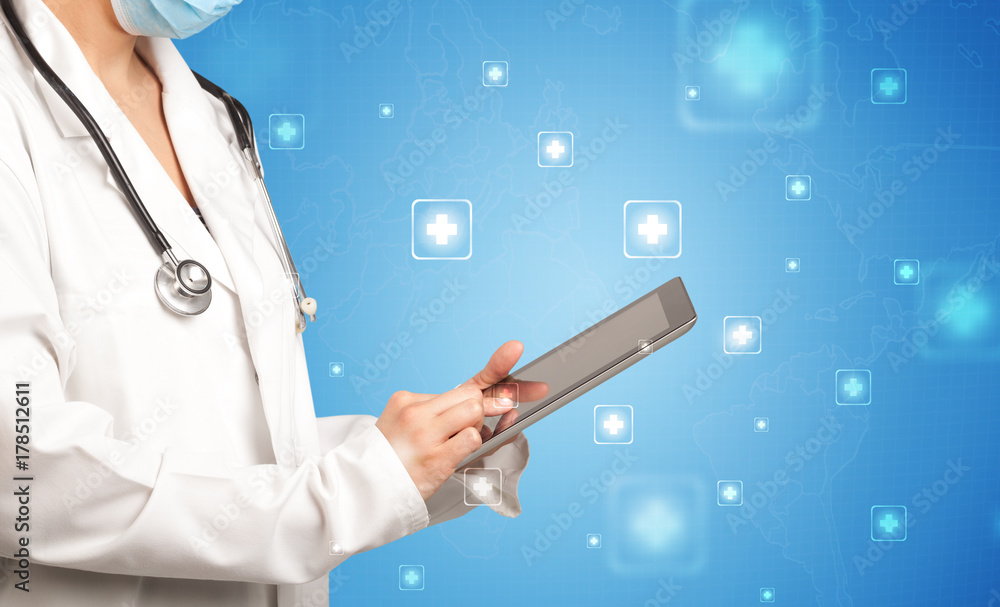 Female doctor with tablet Female doctor with tablet