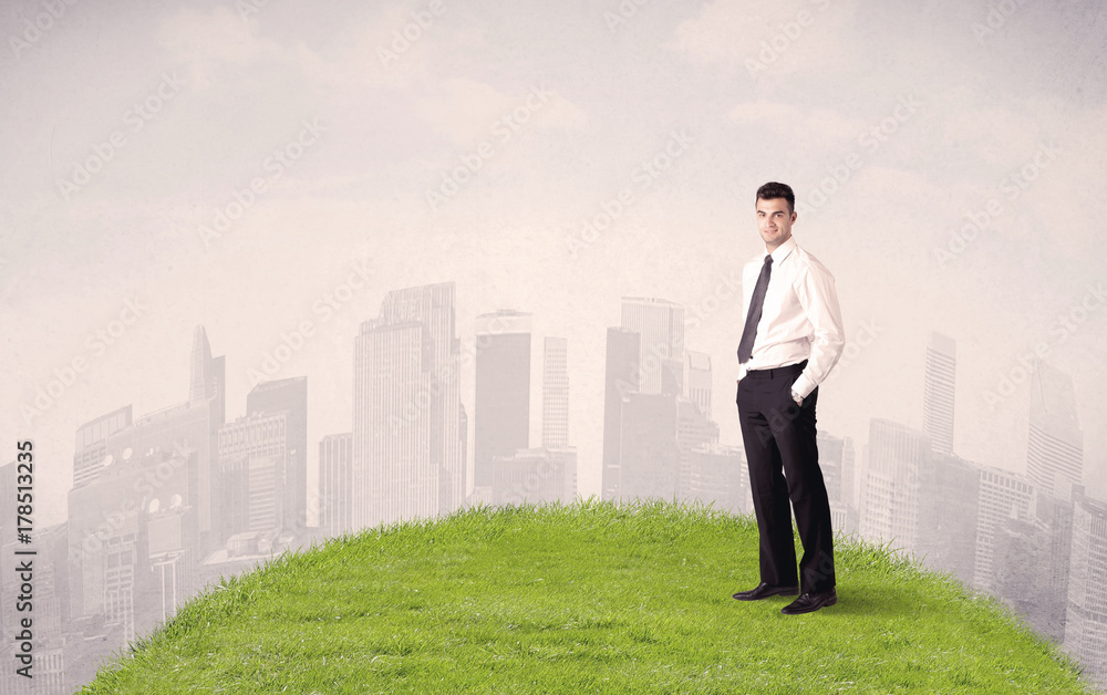 man standing in front of city landscape man standing in front of city landscape