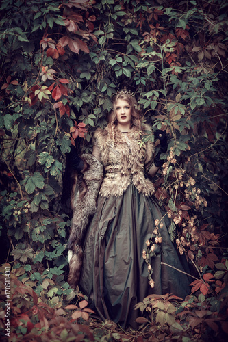 fairy in a fabulous autumn forest