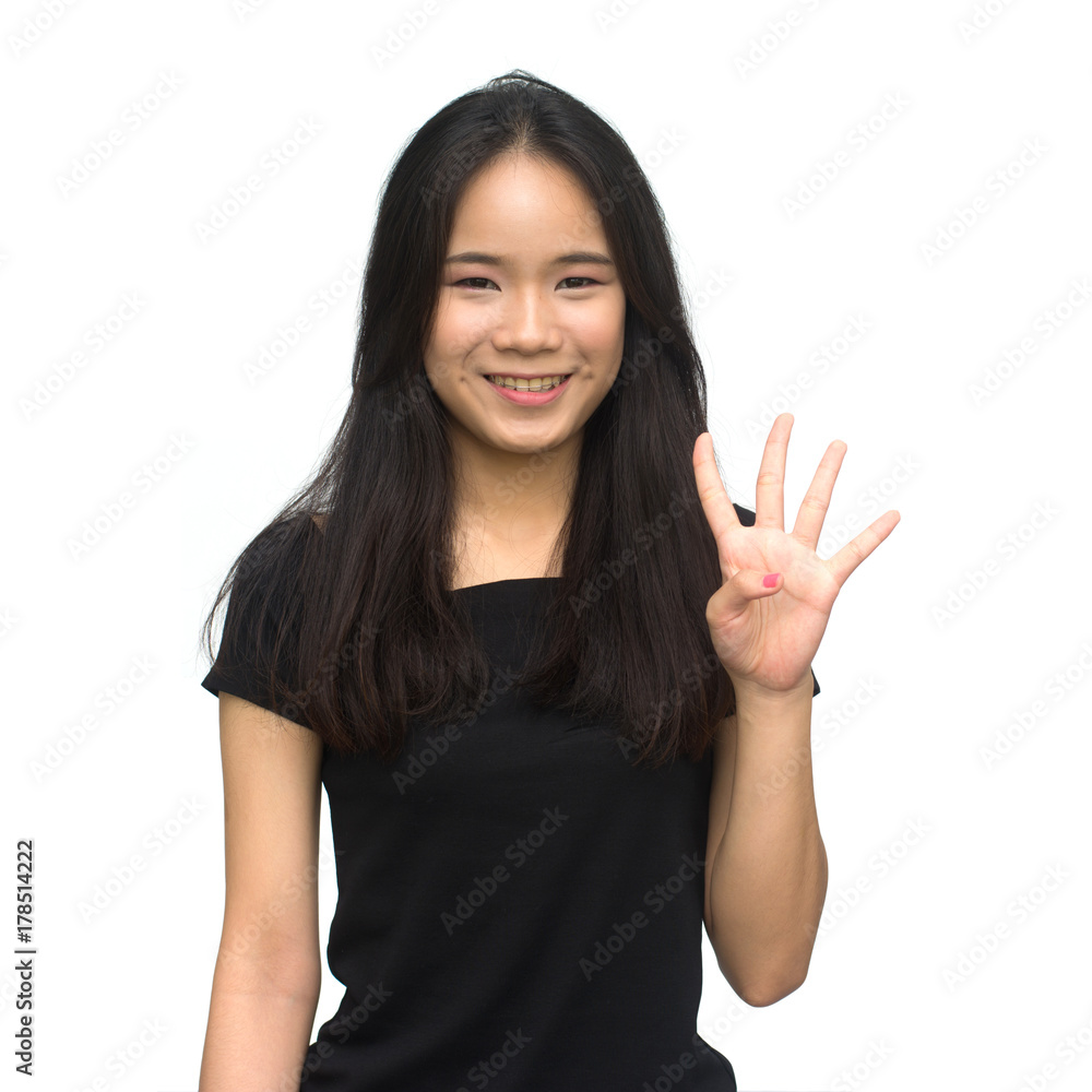 Happy asian girl counting to seven isolated on white background Happy asian girl counting to seven isolated on white background