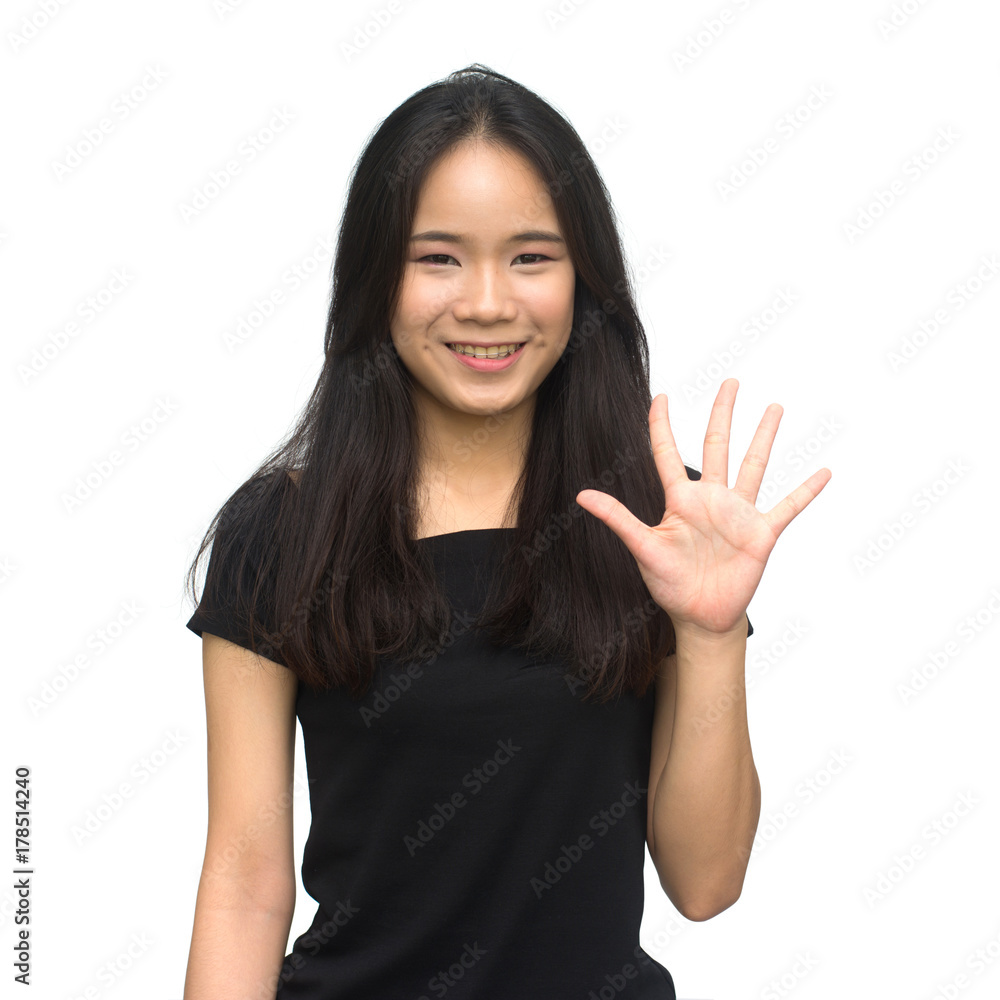 Happy asian girl counting to seven isolated on white background Happy asian girl counting to seven isolated on white background