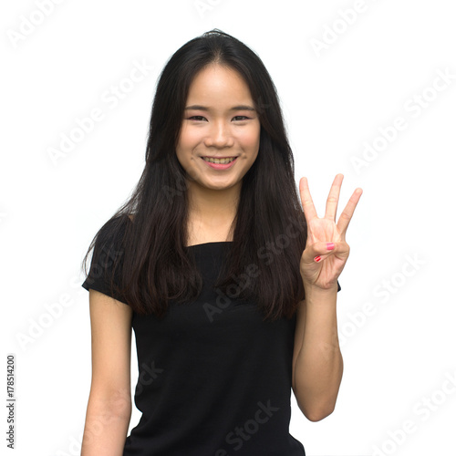 Wallpaper Mural Happy asian girl counting to seven isolated on white background Torontodigital.ca
