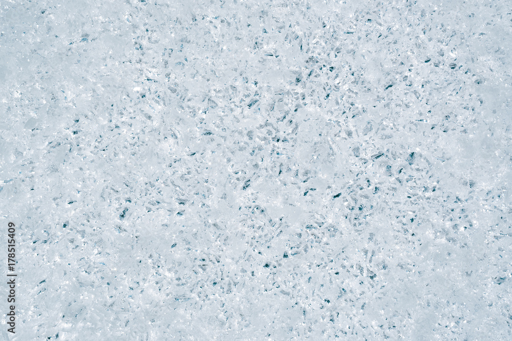 A cut of ice with voids texture background 